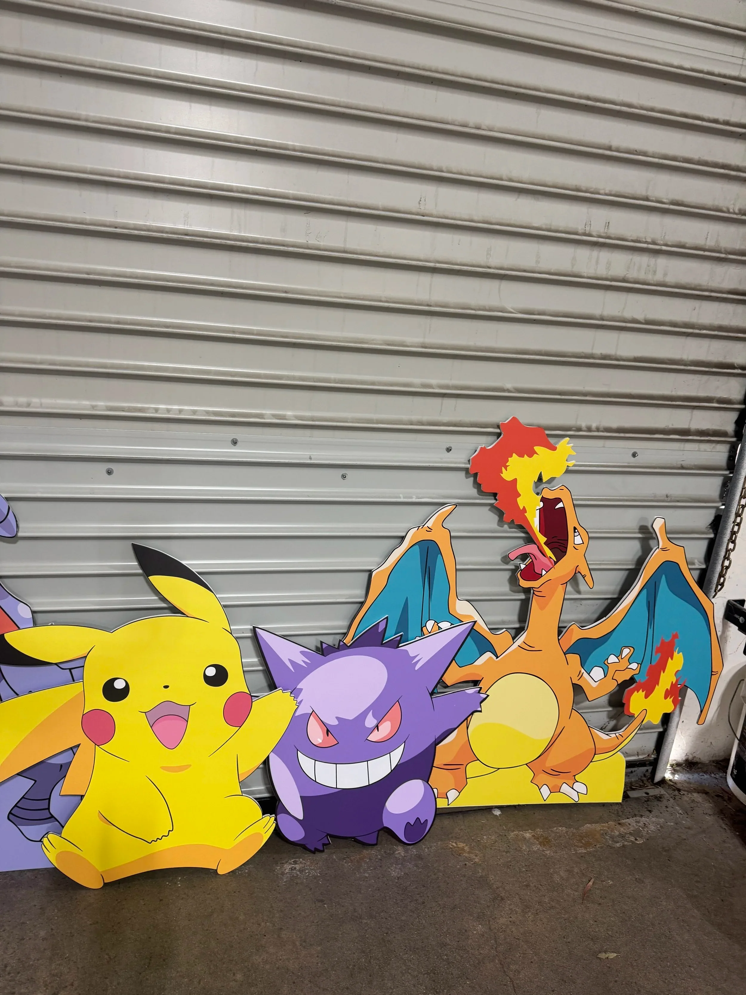 Pokemon cutouts lined up in the studio